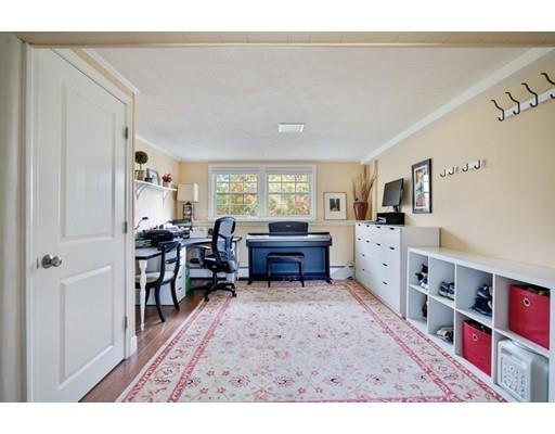 11 Glover Road Needham, MA 02494 - Photo 15 of 24 a living room with furniture and a wooden floor