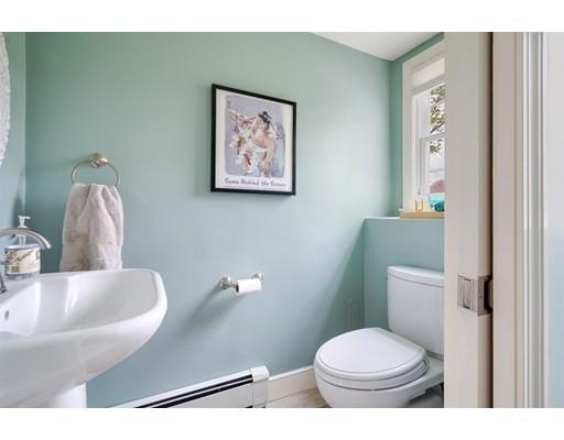 11 Glover Road Needham, MA 02494 - Photo 17 of 24 a bathroom with a toilet and a sink