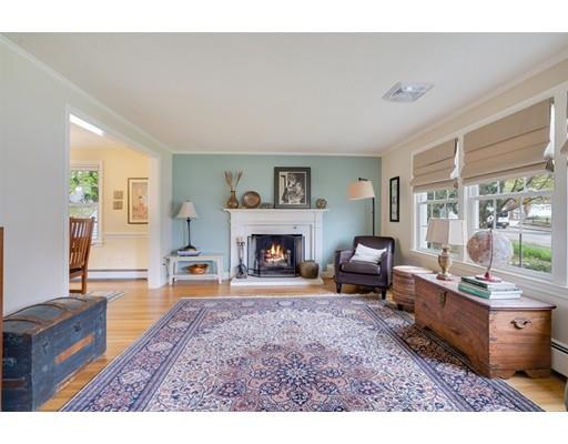 11 Glover Road Needham, MA 02494 - Photo 6 of 24 a living room with furniture window and a fireplace