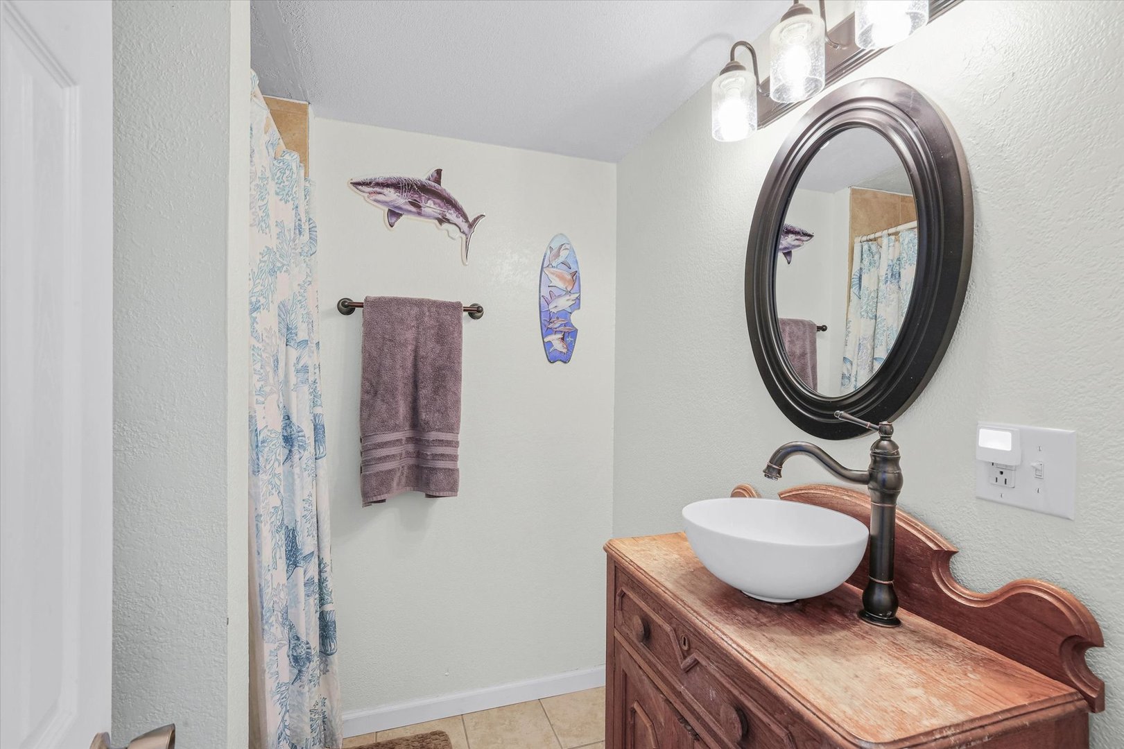 107 Washington Street Congerville, IL 61729 - Photo 16 of 39 a bathroom with a toilet a sink and mirror