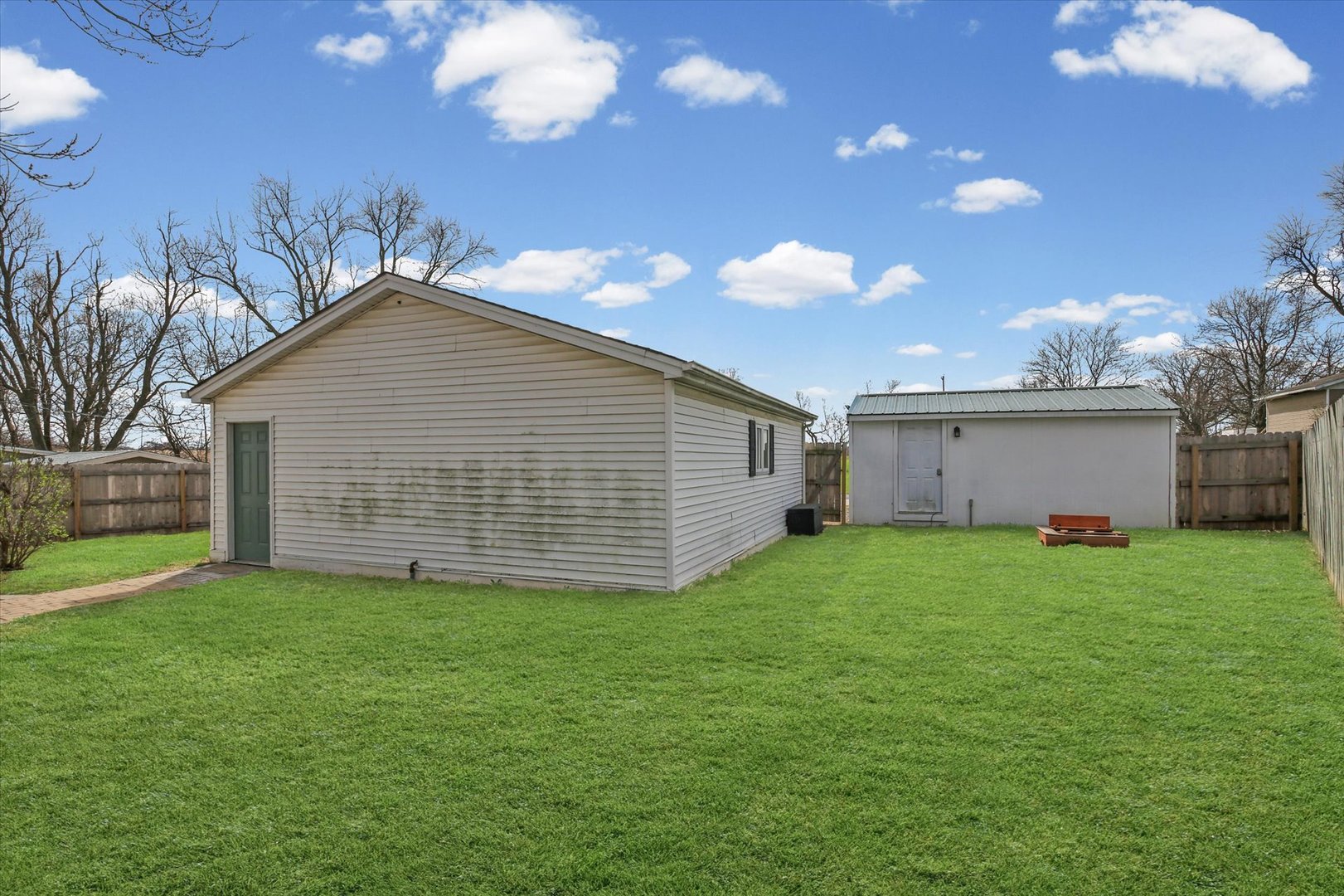 107 Washington Street Congerville, IL 61729 - Photo 37 of 39 a view of a backyard with a garden and entertaining space
