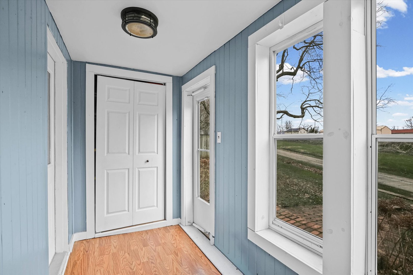107 Washington Street Congerville, IL 61729 - Photo 6 of 39 a view of a hallway to rooms and stairs