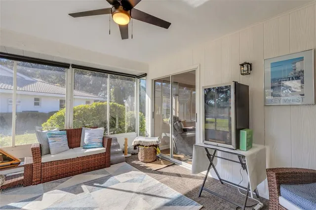 a living room with furniture and a window
