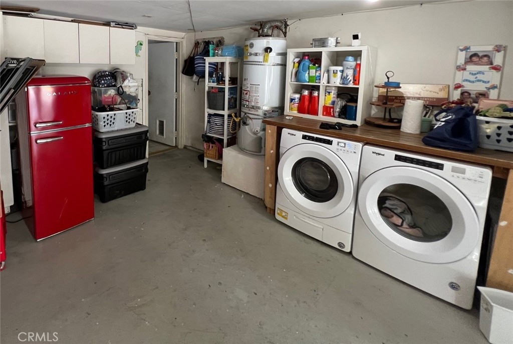 18146 Oxnard Street, Unit 48 Tarzana, CA 91356 - Photo 37 of 52 a utility room with dryer and washer