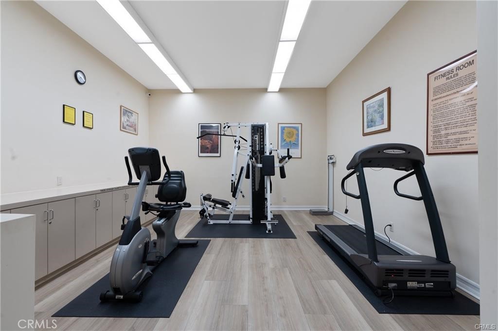 18146 Oxnard Street, Unit 48 Tarzana, CA 91356 - Photo 47 of 52 a view of a room with gym equipment