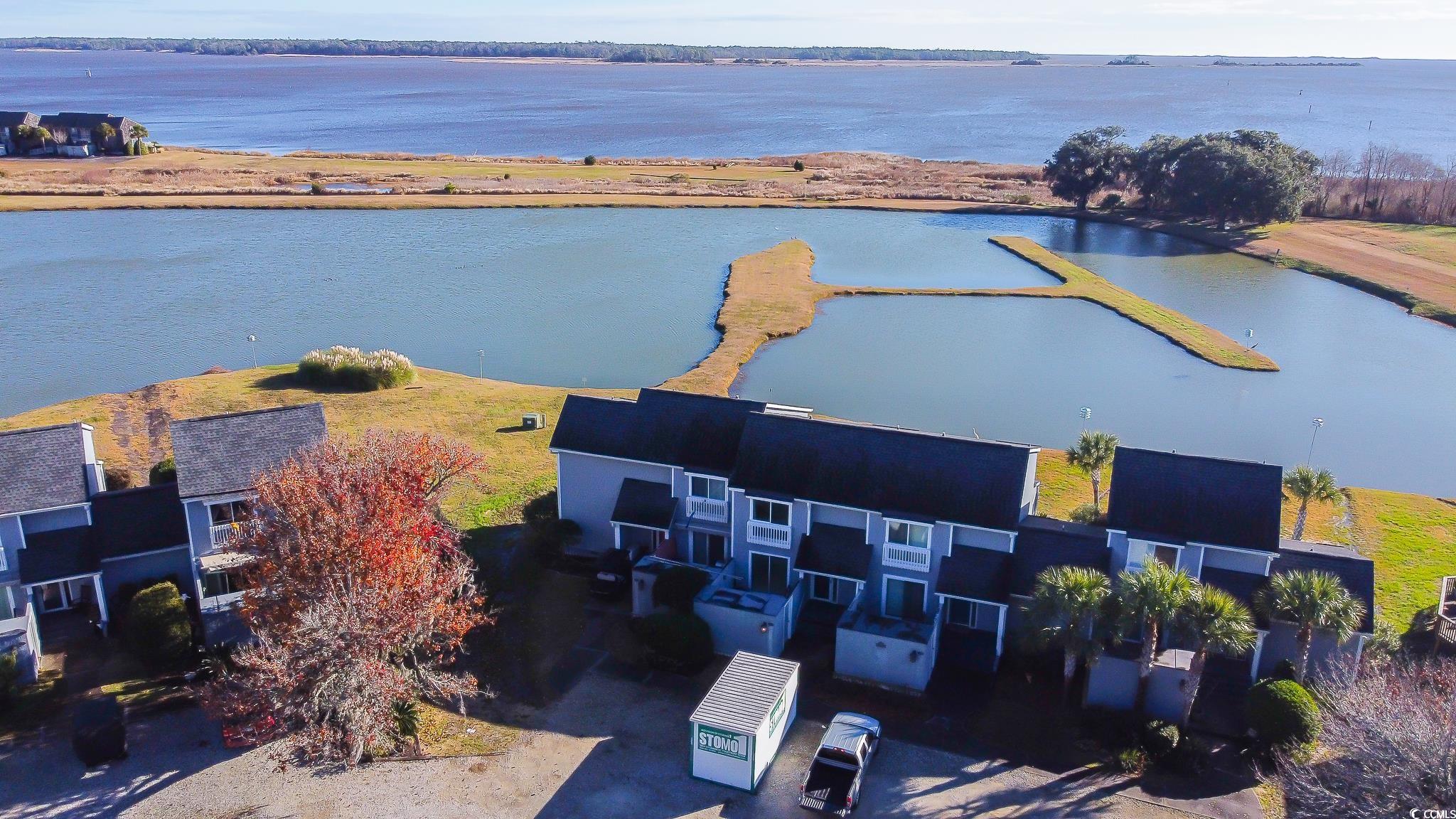 43 Pheasant Loop, Unit 302 Georgetown, SC 29440 - Photo 2 of 38 Aerial view of a nearby body of water