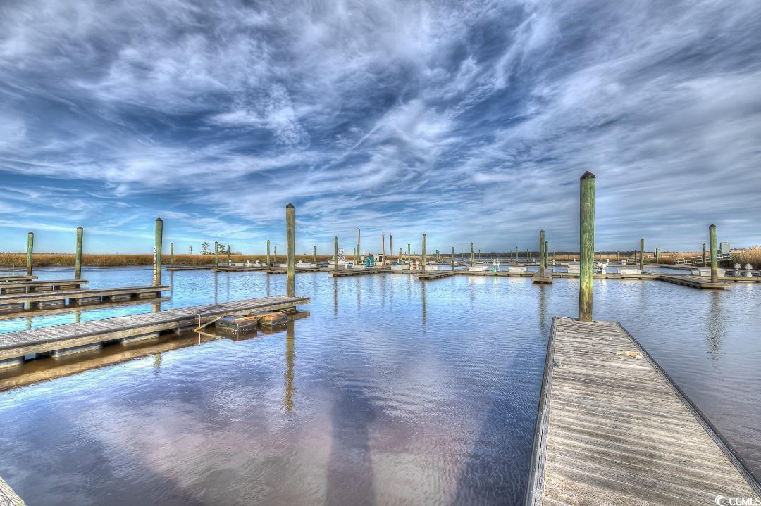 43 Pheasant Loop, Unit 302 Georgetown, SC 29440 - Photo 26 of 38 Dock area featuring a water view