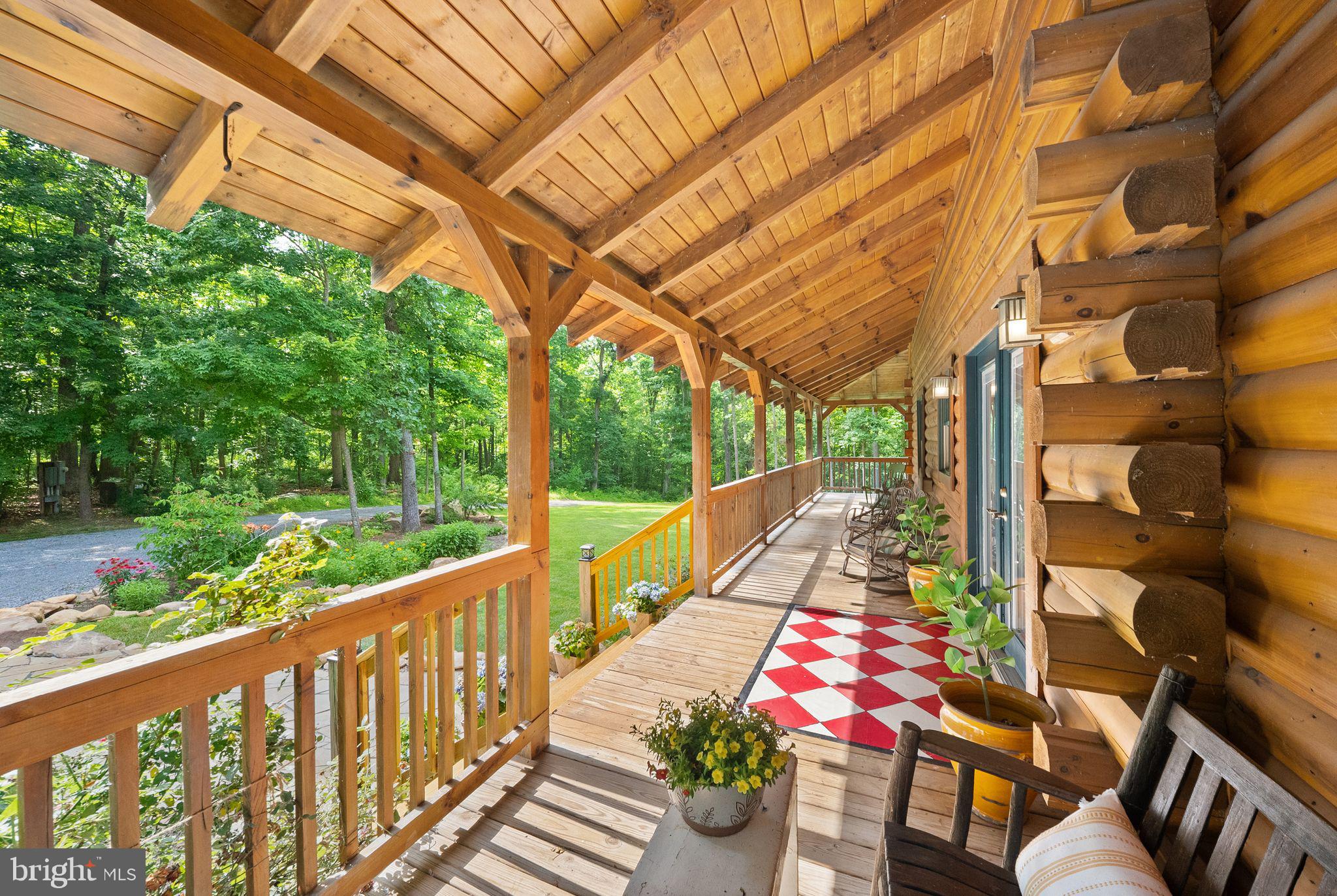 4020 Millwood Road Boyce, VA 22620 - Photo 8 of 132 Expansive covered porch showcasing soaring timbers