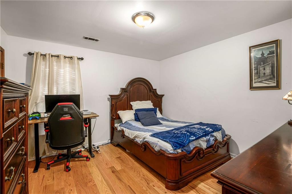 614 Robinson Avenue Southeast Atlanta, GA 30312 - Photo 21 of 74 a living room with furniture and a wooden floor