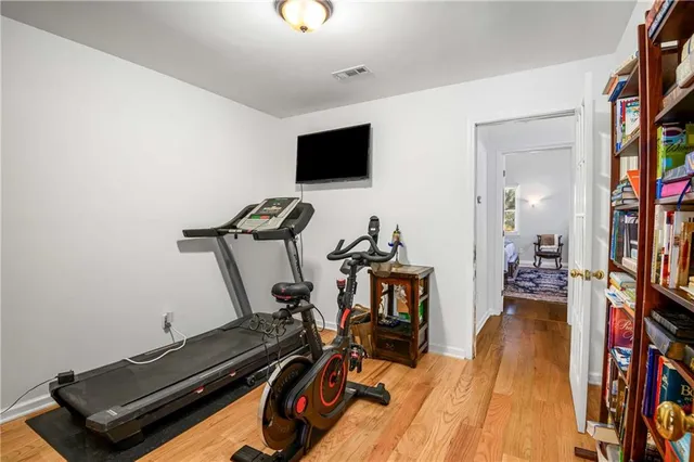 a bathroom with a tub and a shower
