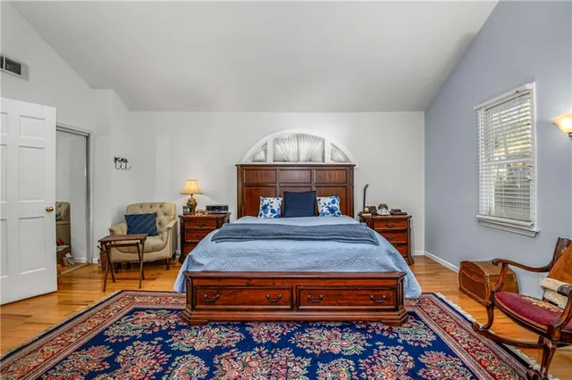 a house that has a tree in front of it