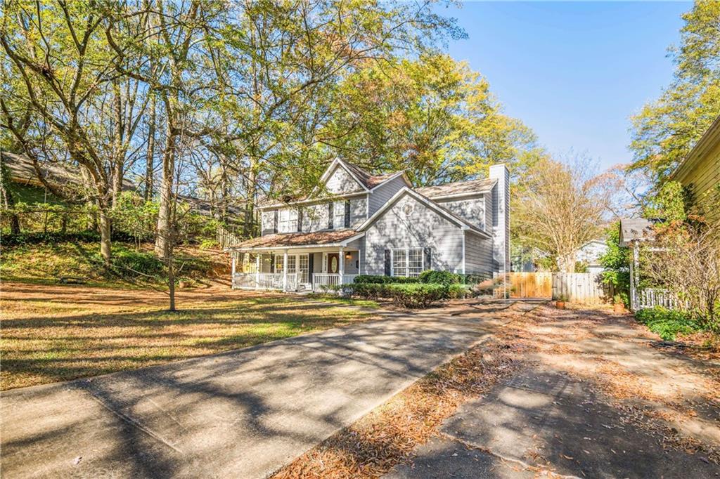 614 Robinson Avenue Southeast Atlanta, GA 30312 - Photo 37 of 74 a view of a big house with a big yard and large trees