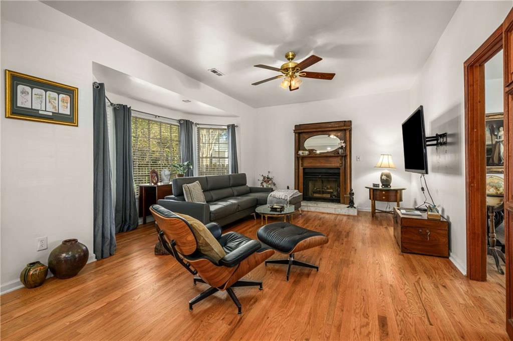 614 Robinson Avenue Southeast Atlanta, GA 30312 - Photo 6 of 74 a living room with furniture and a flat screen tv
