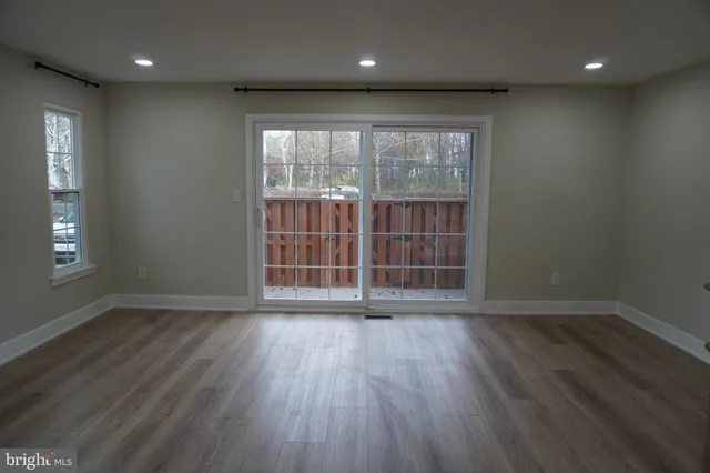 a view of a hallway with staircase