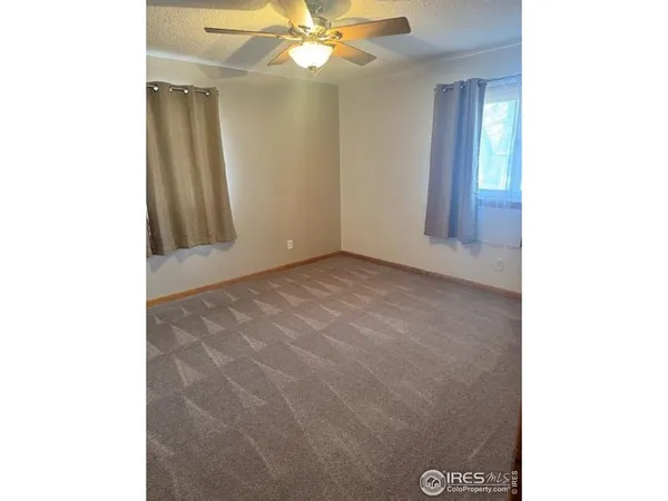 a view of an empty room with window