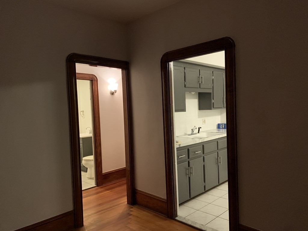44 Crawford Street, Unit 3 Fall River, MA 02724 - Photo 2 of 8 a view of a bathroom from a hallway
