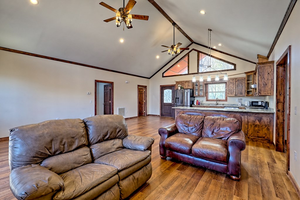 87 Mason Lane Marble, NC 28905 - Photo 22 of 66 a living room with furniture and a wooden floor