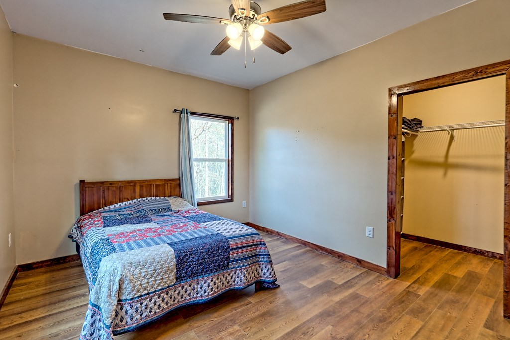 87 Mason Lane Marble, NC 28905 - Photo 41 of 66 a bedroom with a bed and a window