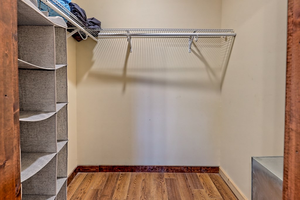 87 Mason Lane Marble, NC 28905 - Photo 42 of 66 a view of walk in closet with empty racks