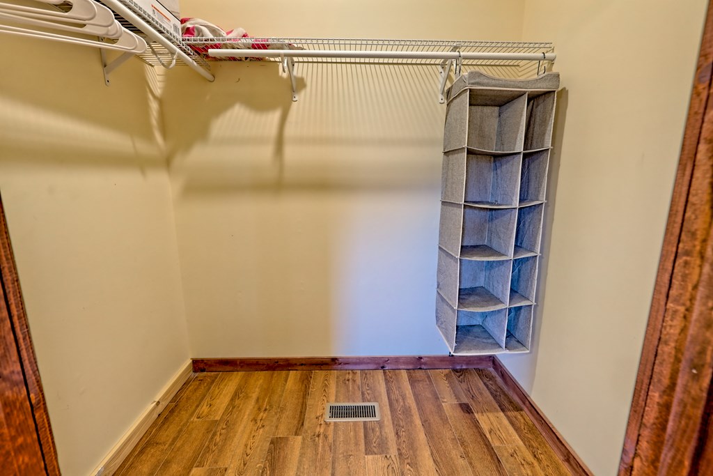 87 Mason Lane Marble, NC 28905 - Photo 49 of 66 a view of walk in closet with wooden floor