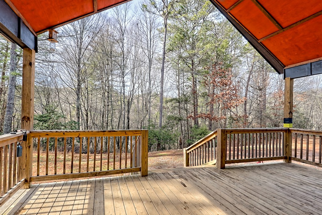 87 Mason Lane Marble, NC 28905 - Photo 58 of 66 a view of a wooden roof deck