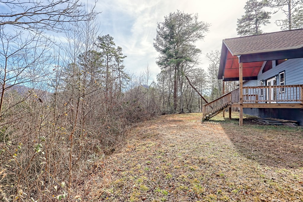 87 Mason Lane Marble, NC 28905 - Photo 62 of 66 a view of a house with a yard