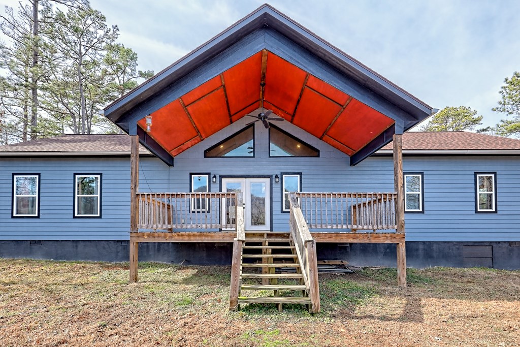 87 Mason Lane Marble, NC 28905 - Photo 65 of 66 a backyard of a house with barbeque oven and a yard
