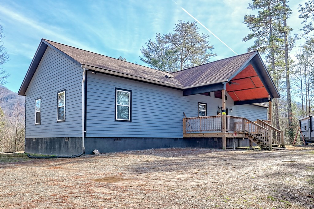 87 Mason Lane Marble, NC 28905 - Photo 7 of 66 a view of a house with a yard