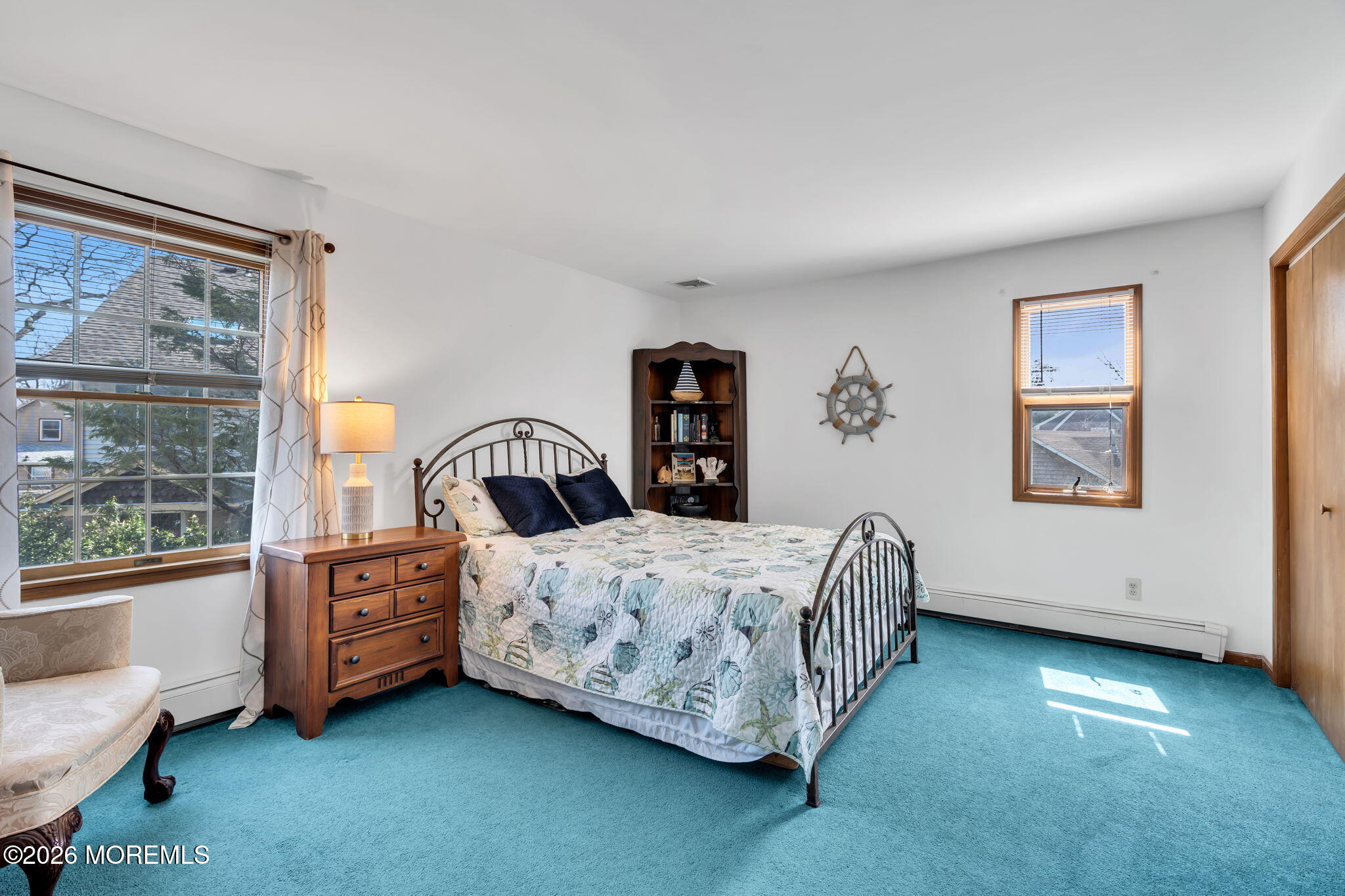 1706 Bay Avenue Point Pleasant, NJ 08742 - Photo 19 of 34 a bedroom with a bed closet and window