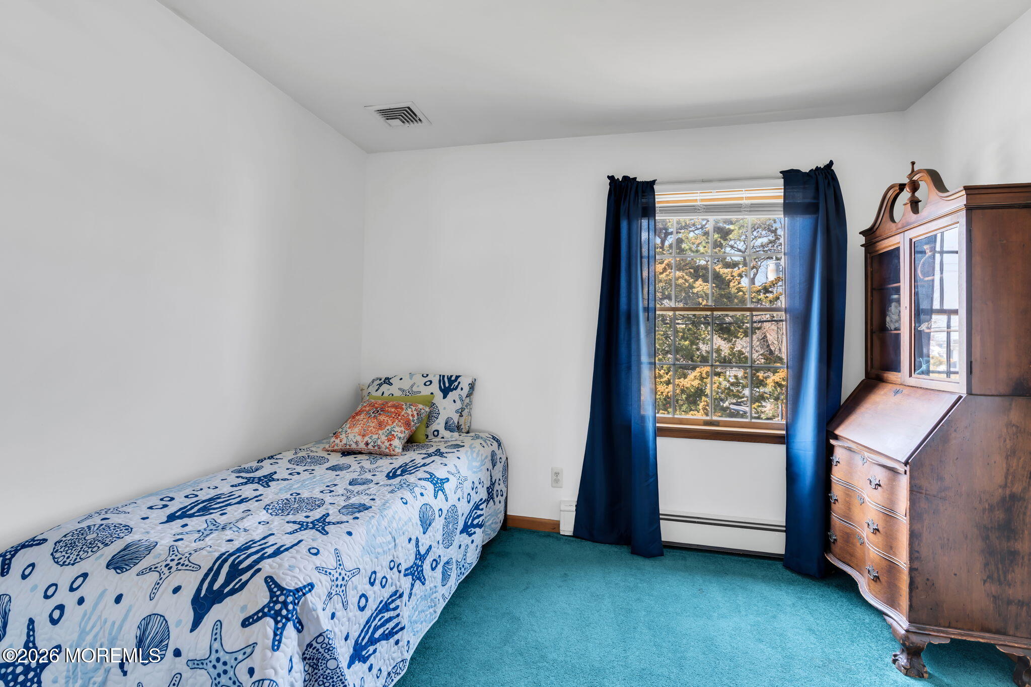 1706 Bay Avenue Point Pleasant, NJ 08742 - Photo 20 of 34 a bedroom with a bed and a window