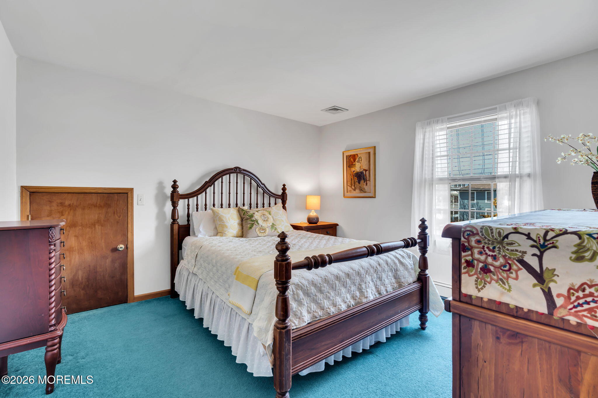 1706 Bay Avenue Point Pleasant, NJ 08742 - Photo 21 of 34 a bedroom with a bed lamp and a window