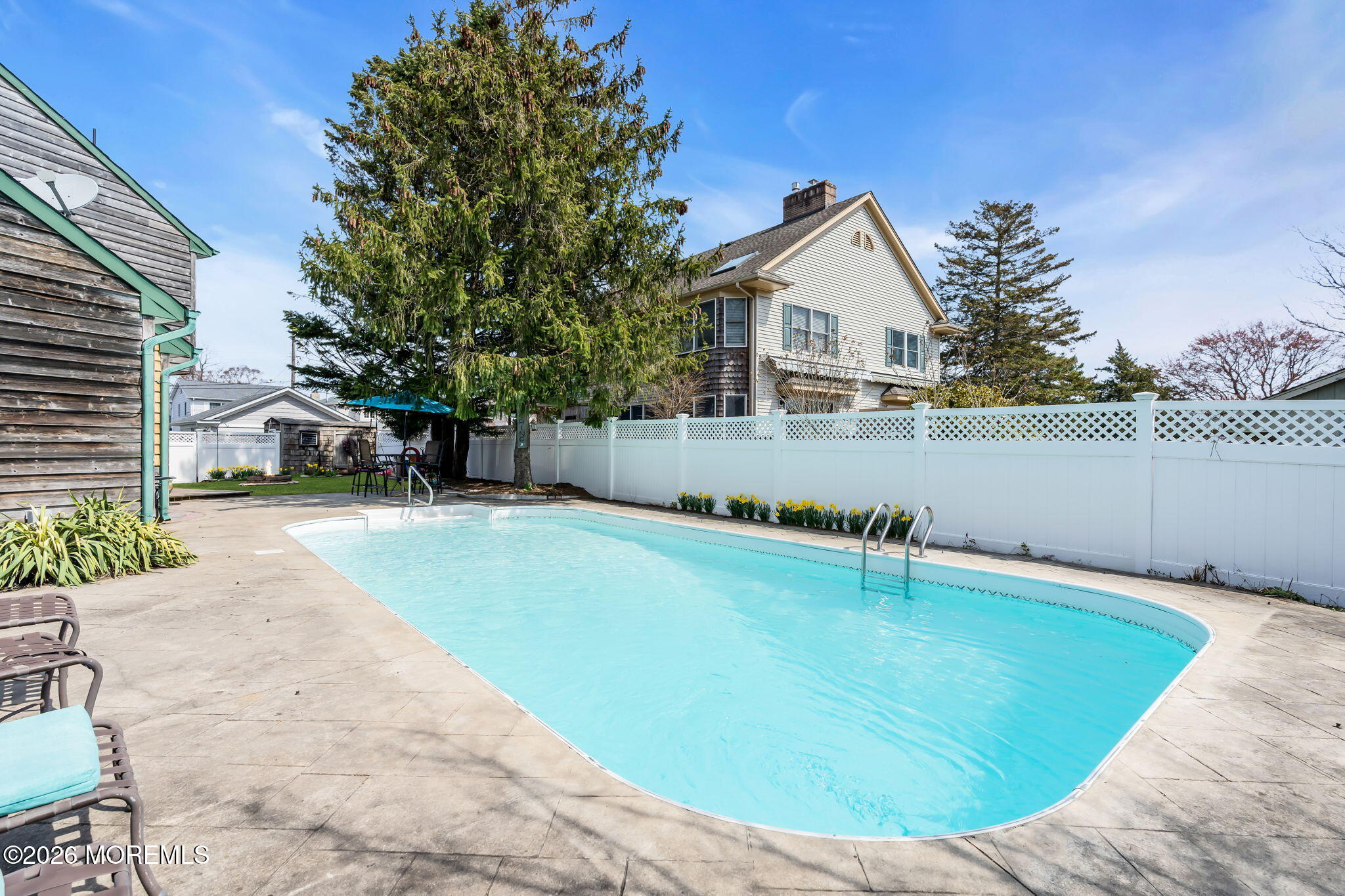 1706 Bay Avenue Point Pleasant, NJ 08742 - Photo 25 of 34 a view of a house with a swimming pool
