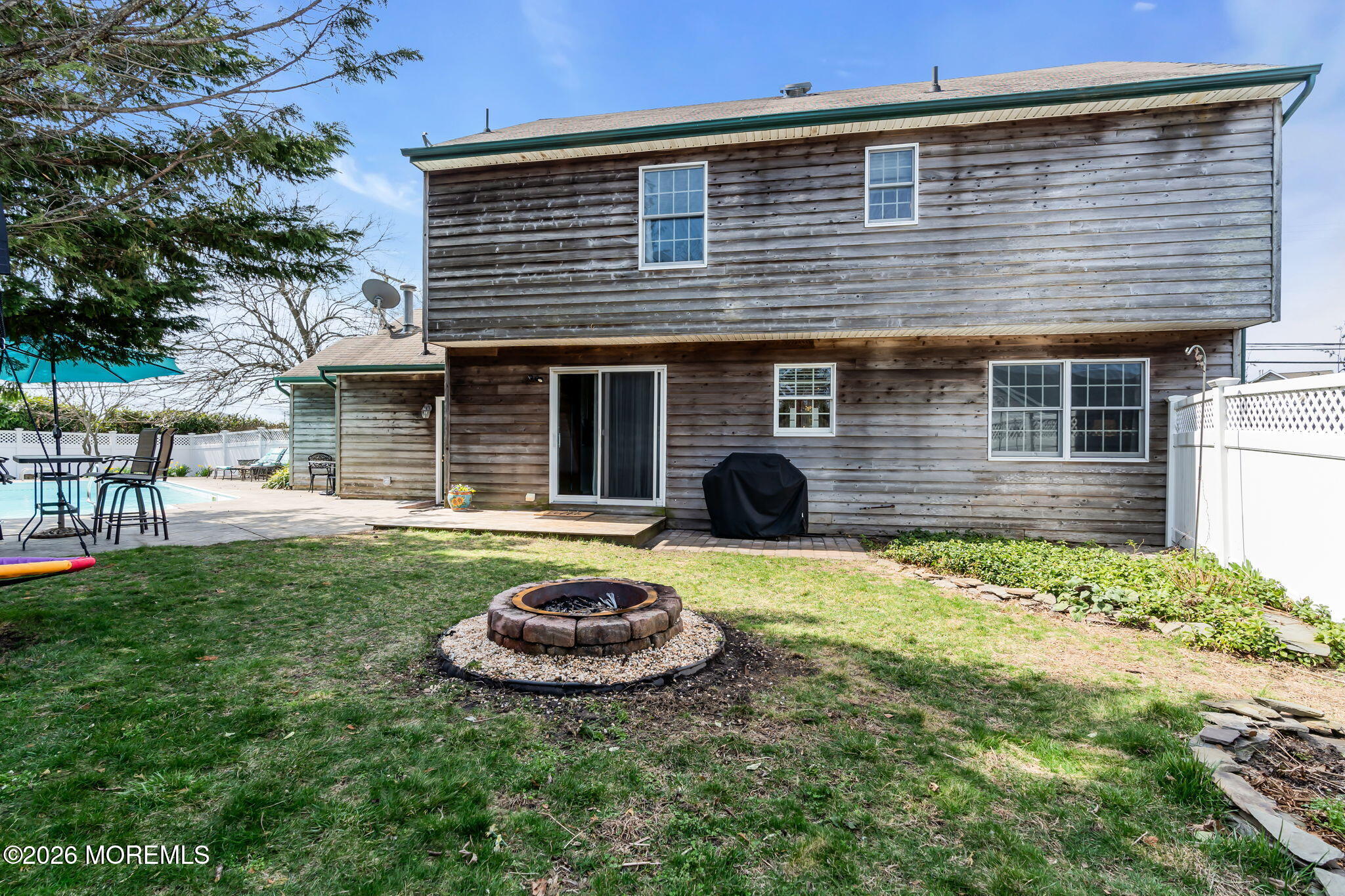 1706 Bay Avenue Point Pleasant, NJ 08742 - Photo 27 of 34 a front view of a house with a yard