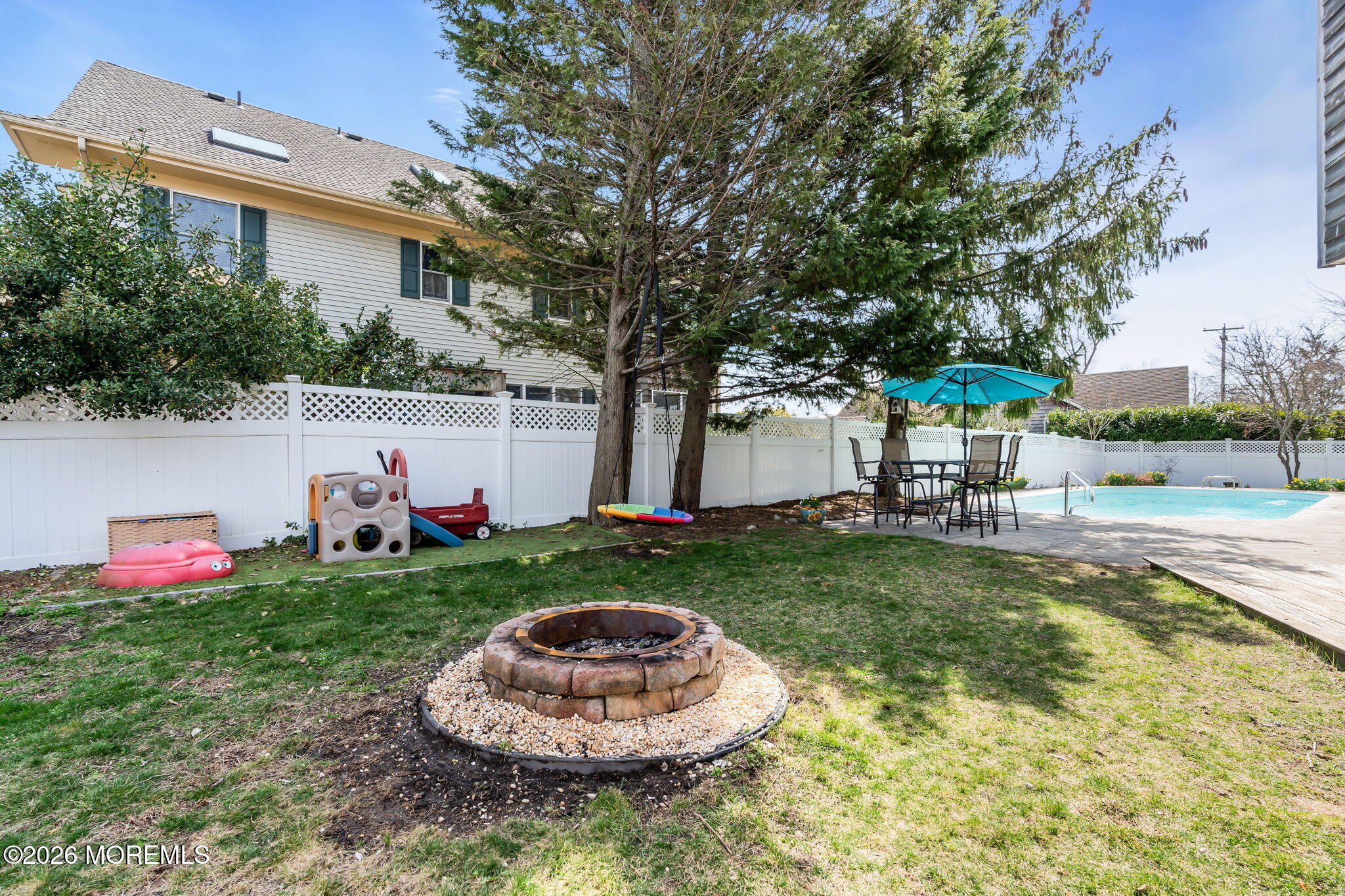 1706 Bay Avenue Point Pleasant, NJ 08742 - Photo 28 of 34 a view of a backyard with plants and a fountain