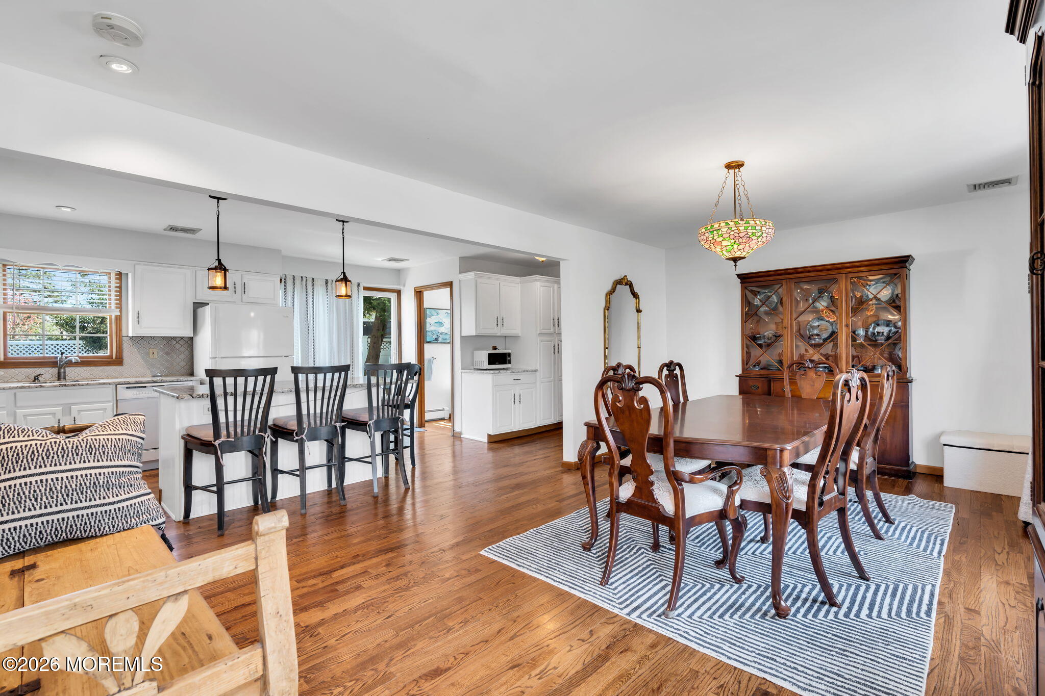 1706 Bay Avenue Point Pleasant, NJ 08742 - Photo 7 of 34 a dining room with furniture and wooden floor
