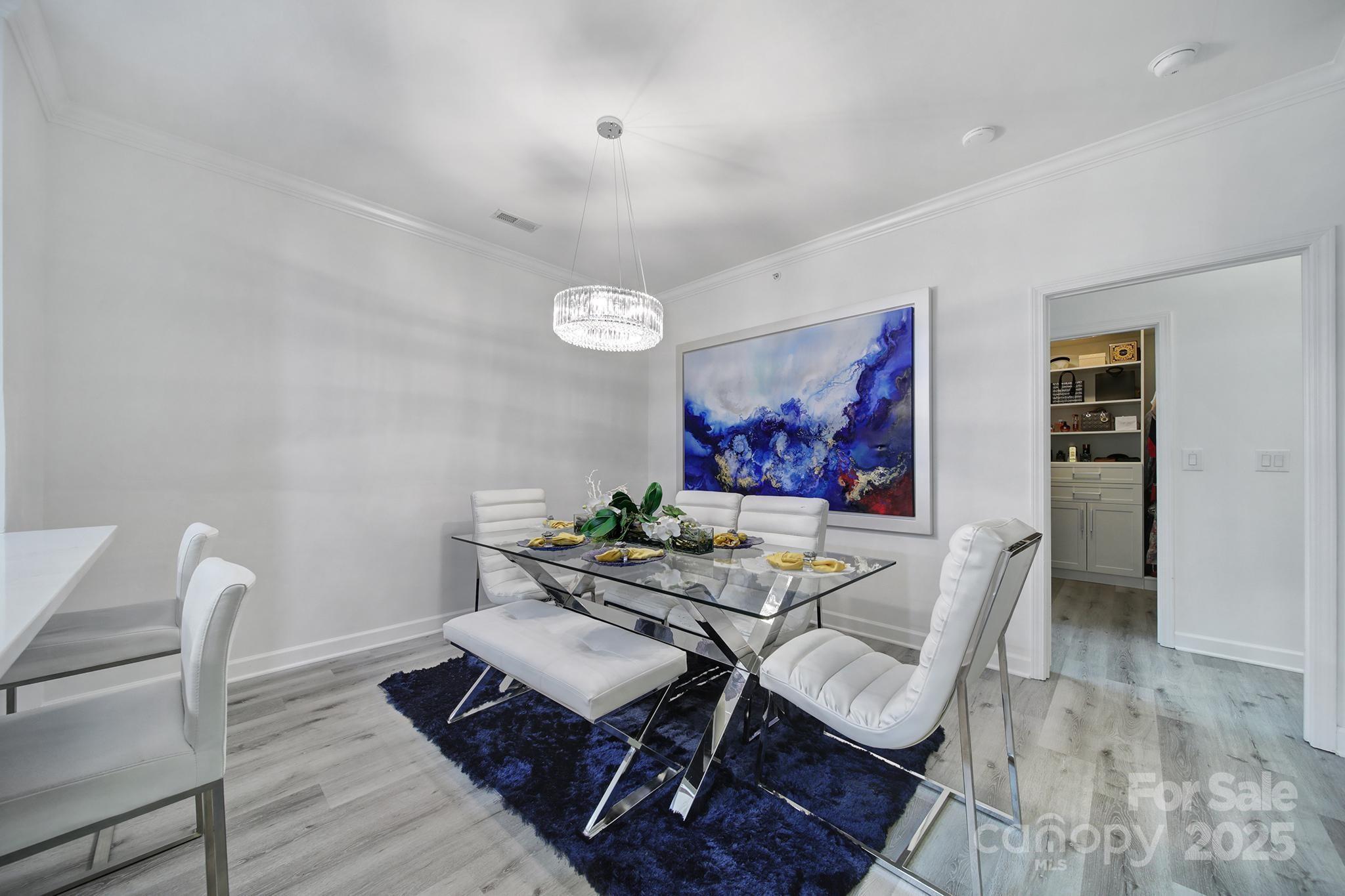 12355 Copper Mountain Boulevard Charlotte, NC 28277 - Photo 18 of 33 a view of a dining room with furniture and wooden floor