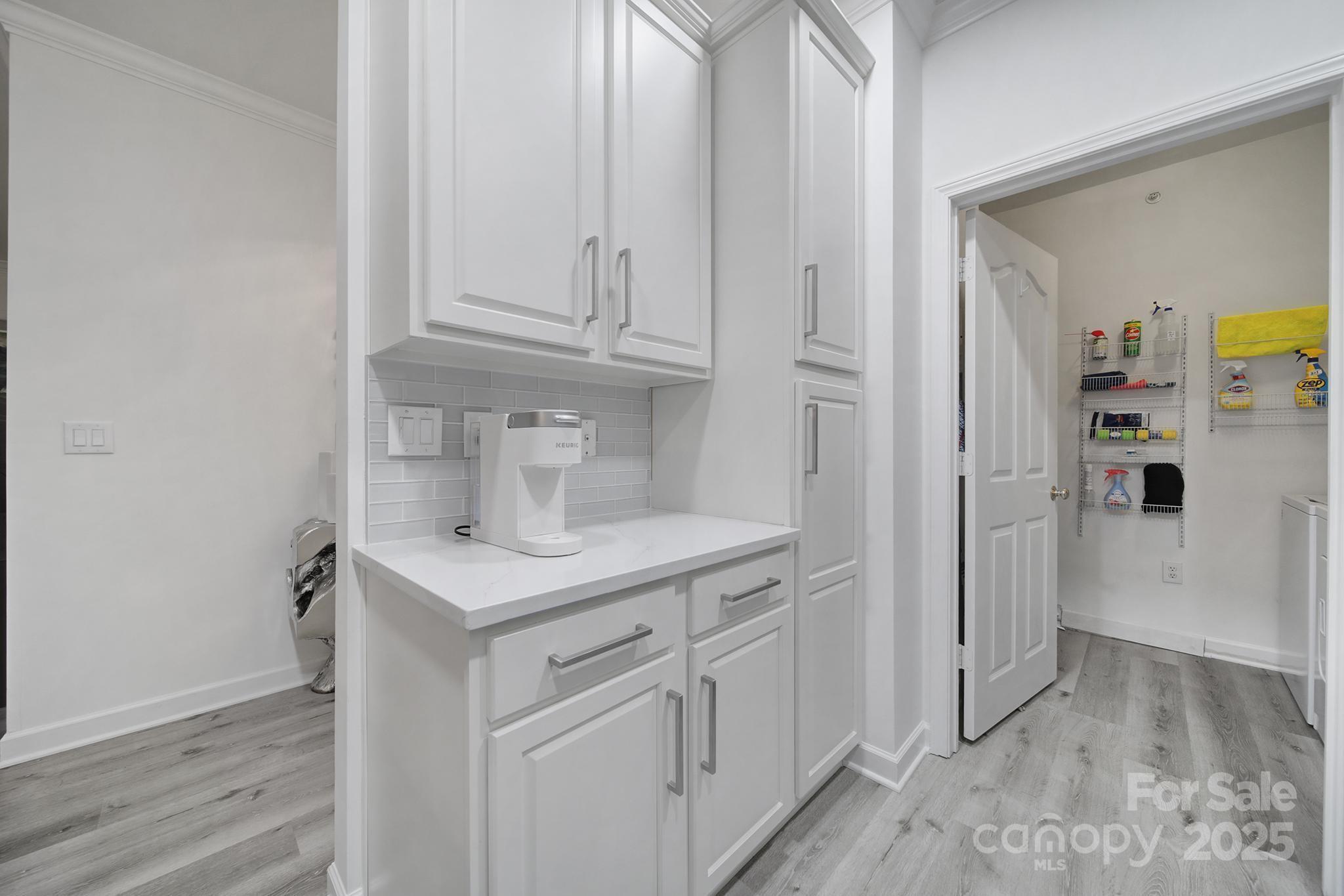 12355 Copper Mountain Boulevard Charlotte, NC 28277 - Photo 21 of 33 a kitchen with cabinets and a refrigerator