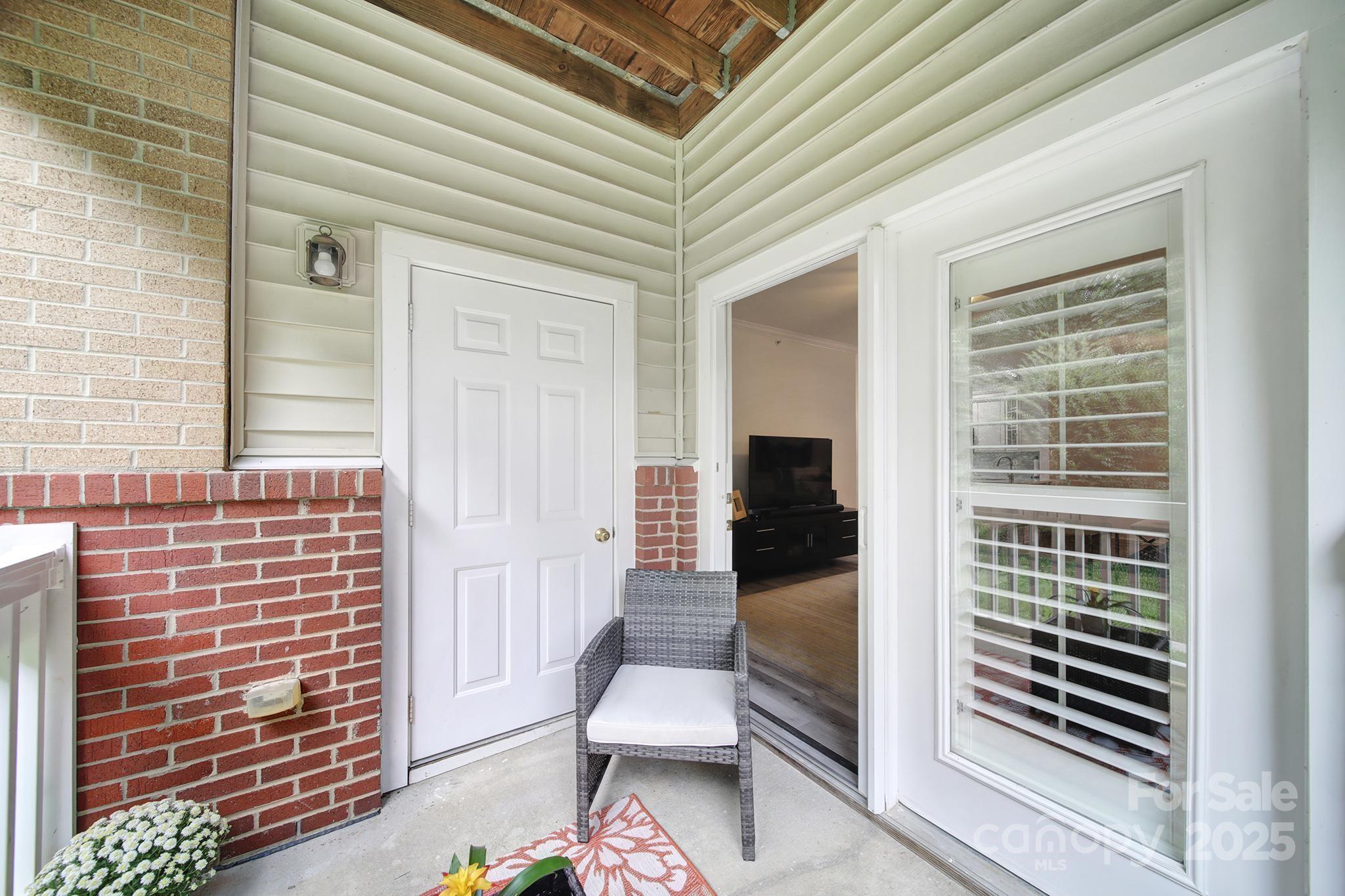 12355 Copper Mountain Boulevard Charlotte, NC 28277 - Photo 29 of 33 a front view of a house with outdoor seating