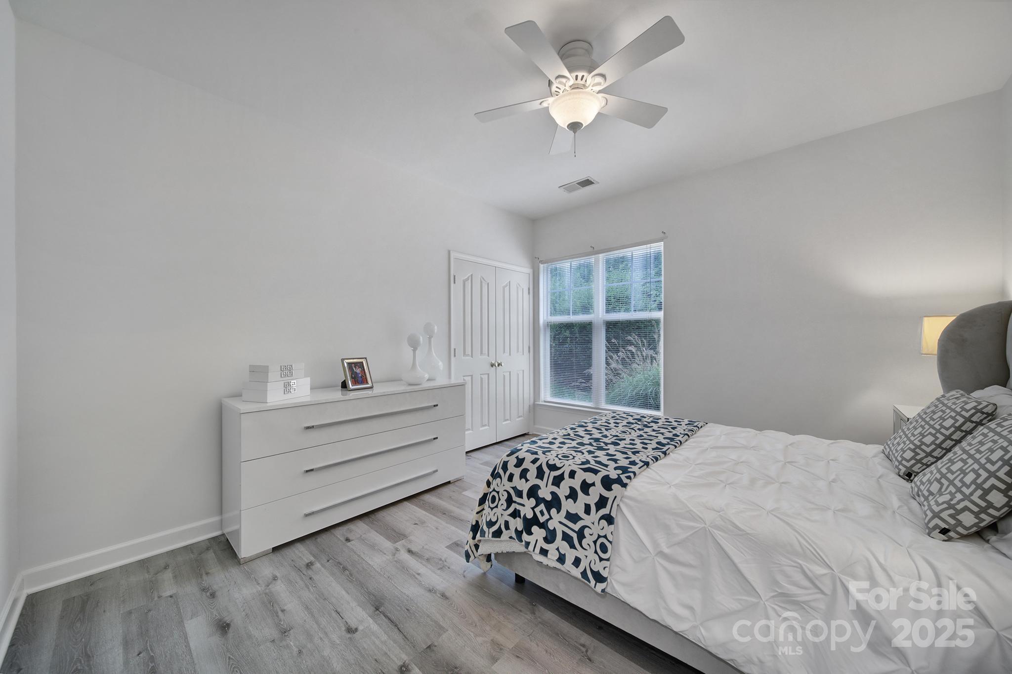 12355 Copper Mountain Boulevard Charlotte, NC 28277 - Photo 10 of 33 a bedroom with a bed and a window