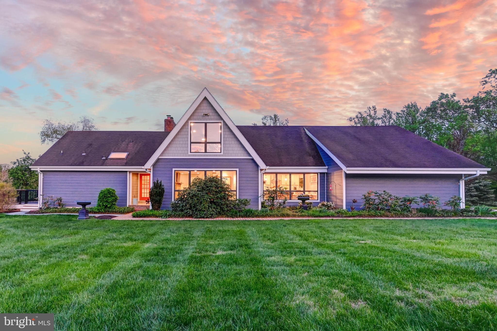 front view of a house with a yard