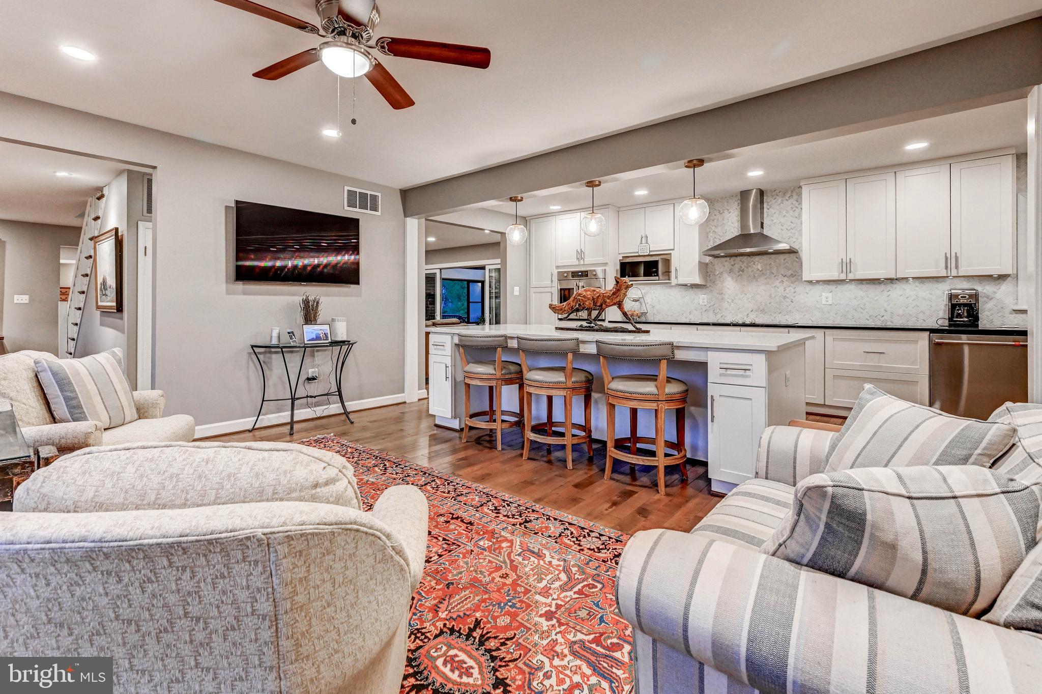 1111 Corbett Road Monkton, MD 21111 - Photo 26 of 33 a living room with furniture and a wooden floor