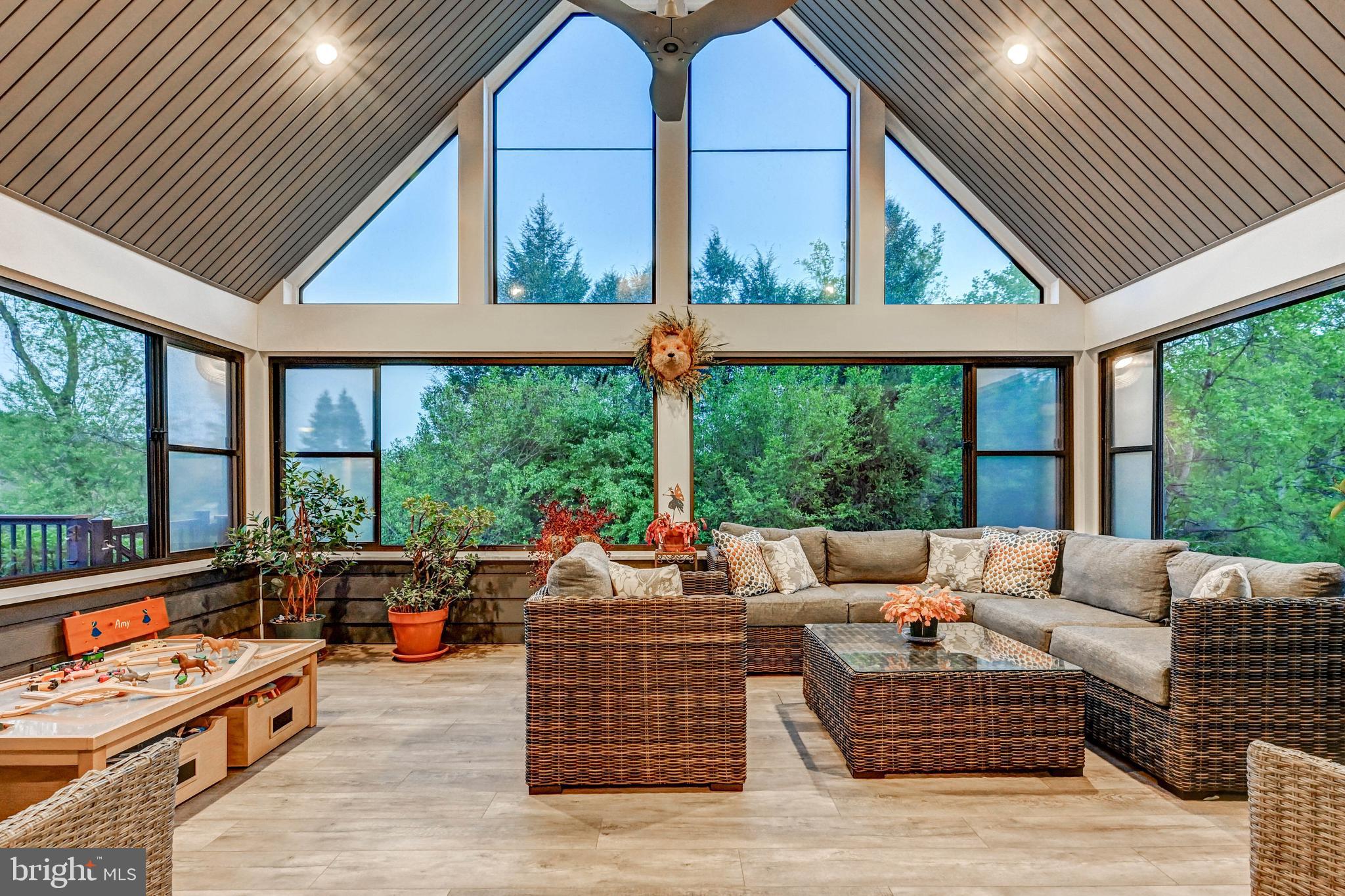 1111 Corbett Road Monkton, MD 21111 - Photo 4 of 33 a living room with furniture and large windows