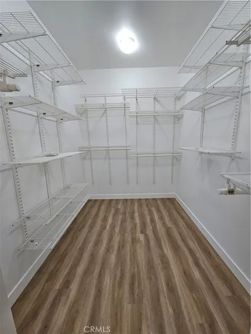 a view of a room with racks on the wall