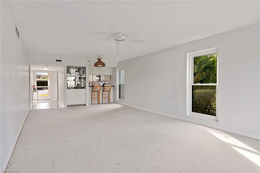 5590 Rattlesnake Hammock Road, Unit M101 Naples, FL 34113 - Photo 3 of 14 Gallery Image 3