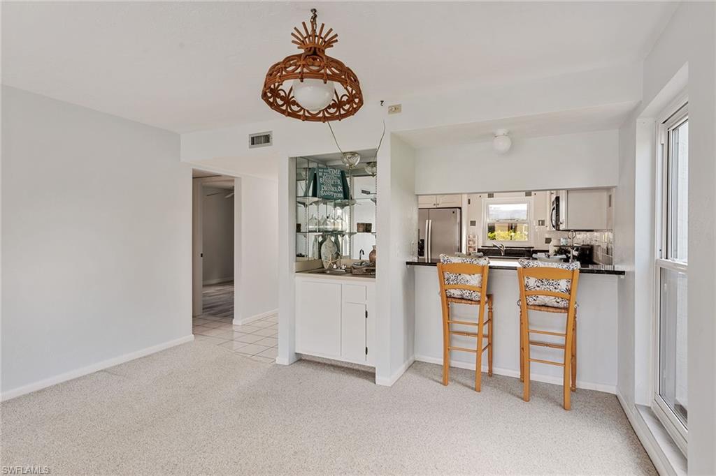 5590 Rattlesnake Hammock Road, Unit M101 Naples, FL 34113 - Photo 6 of 14 Gallery Image 6