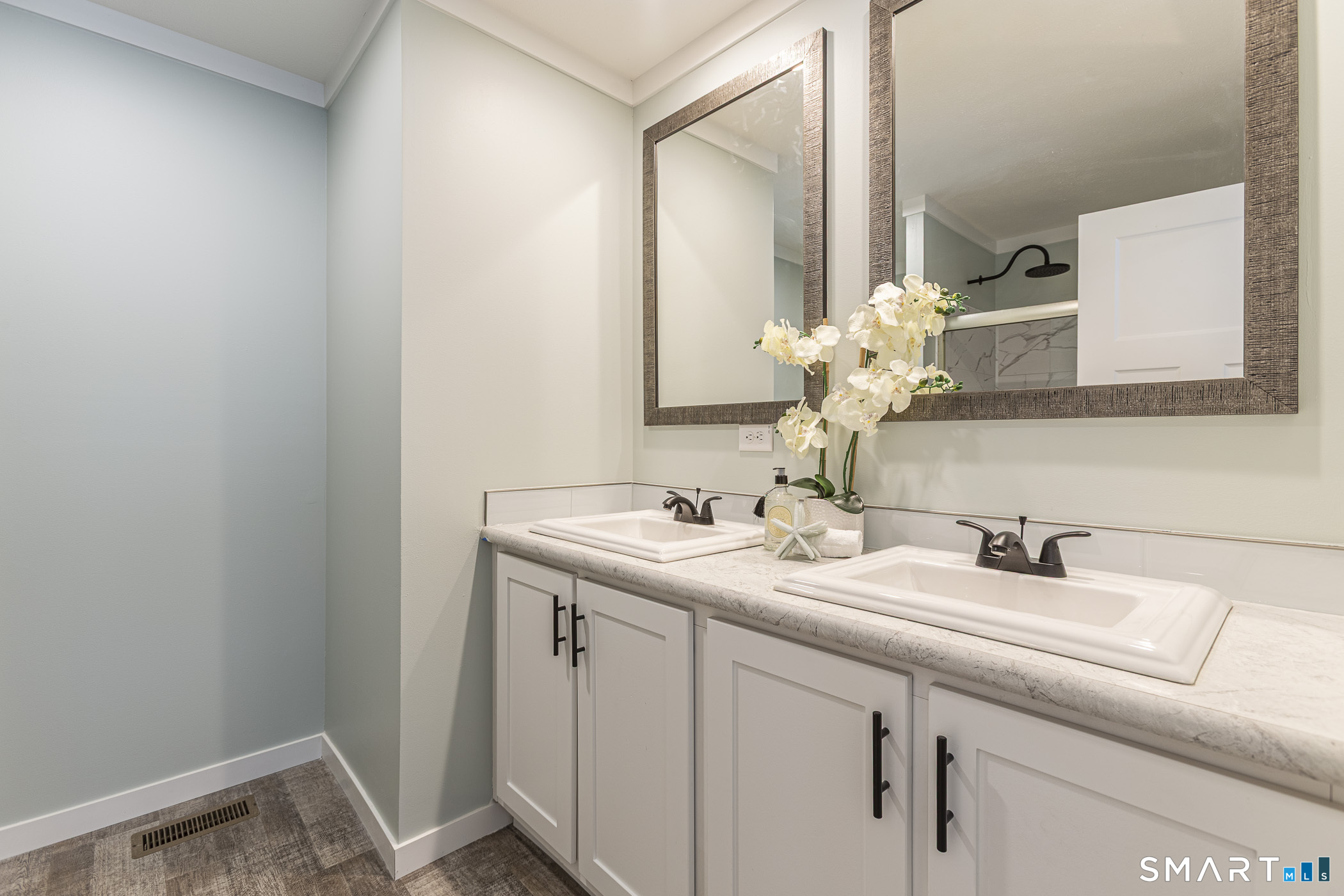 67 Middle Road Enfield, CT 06082 - Photo 19 of 35 a bathroom with a sink and a mirror
