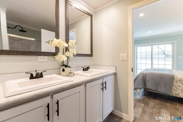 a view of a hallway with a white walls