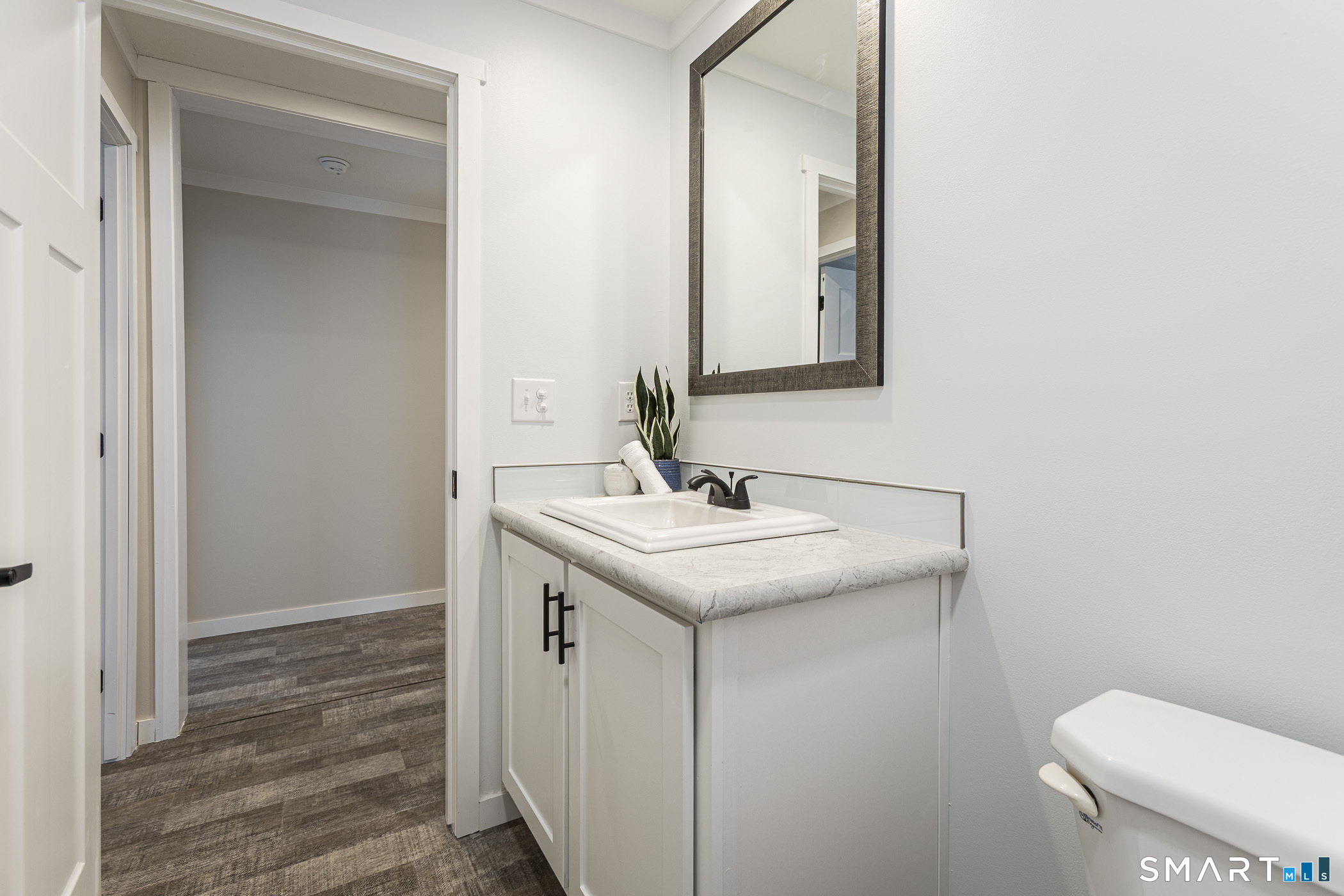 67 Middle Road Enfield, CT 06082 - Photo 24 of 35 a bathroom with a sink and a toilet