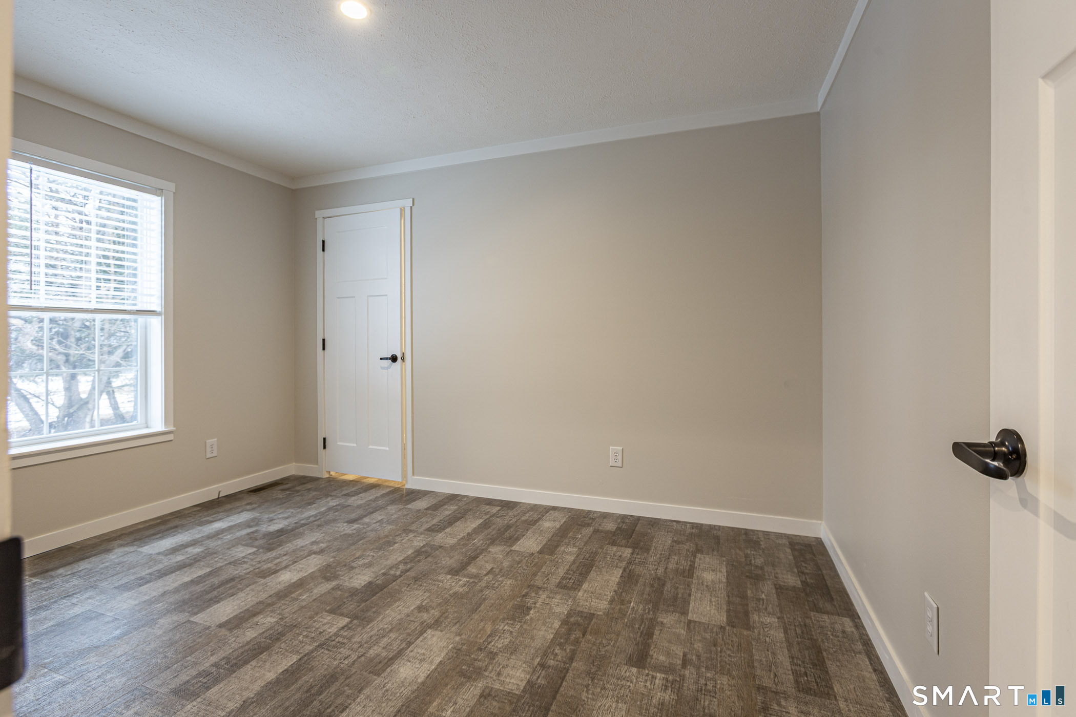 67 Middle Road Enfield, CT 06082 - Photo 27 of 35 an empty room with windows