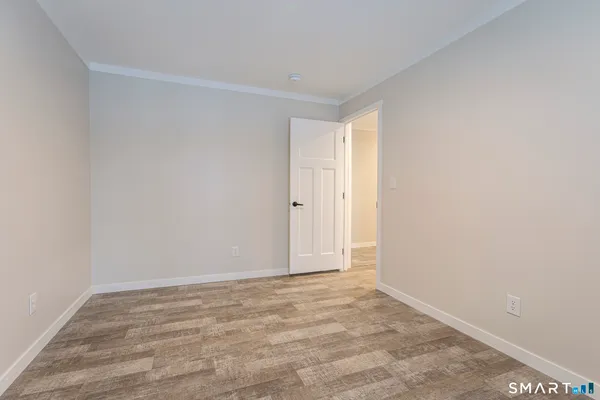 a house with trees in the background